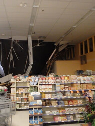 A commercial space sustained significant damage due to a roof collapse.